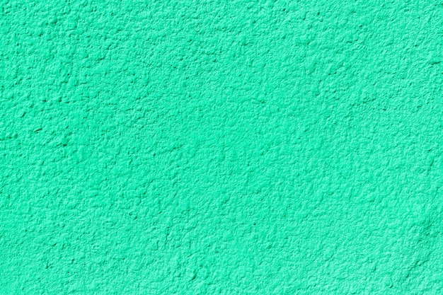 Fondo verde del muro di cemento