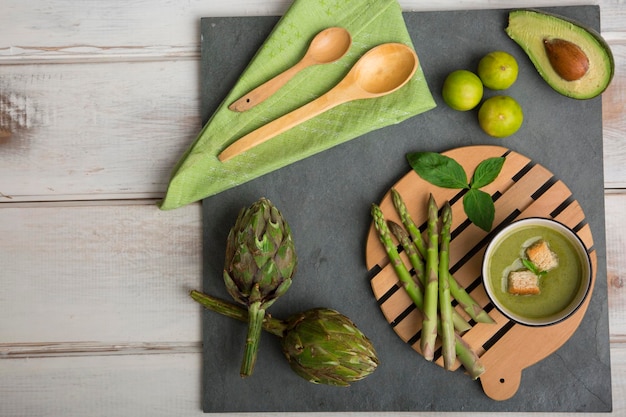 Green cooking supplies kitchen utensils food vegetables