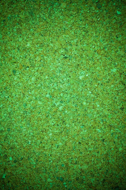 Green cork board background texture.