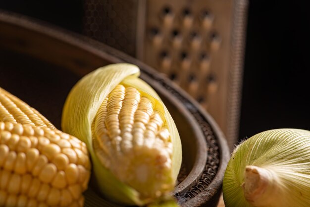 Green corn beautiful green corn cobs on rustic wood selective focus