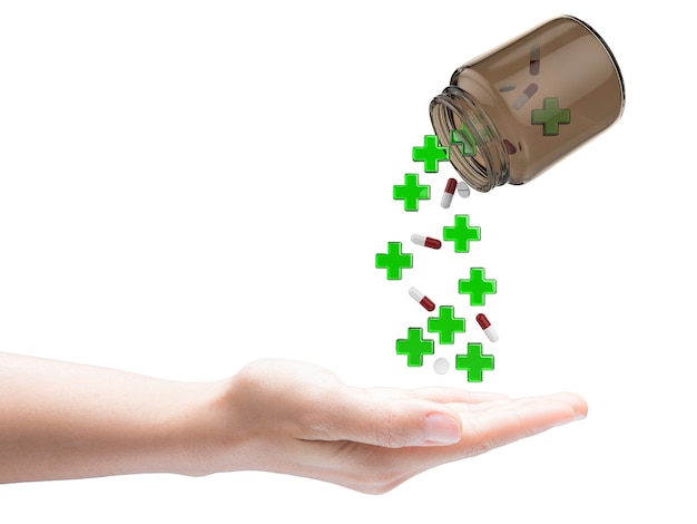 Green cross and pills falling out of bottle