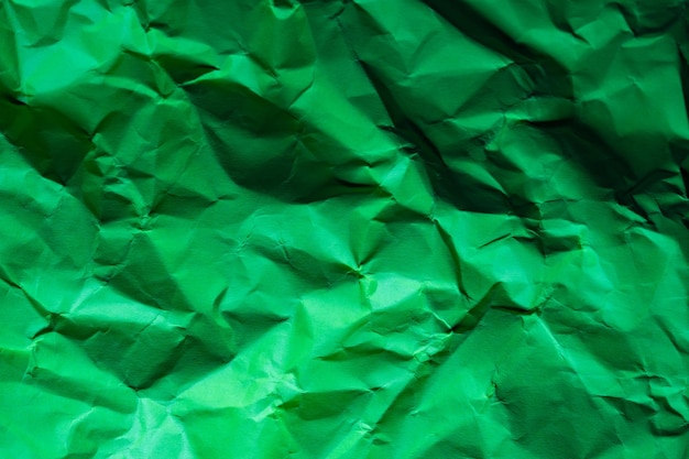 green crumpled paper texture background