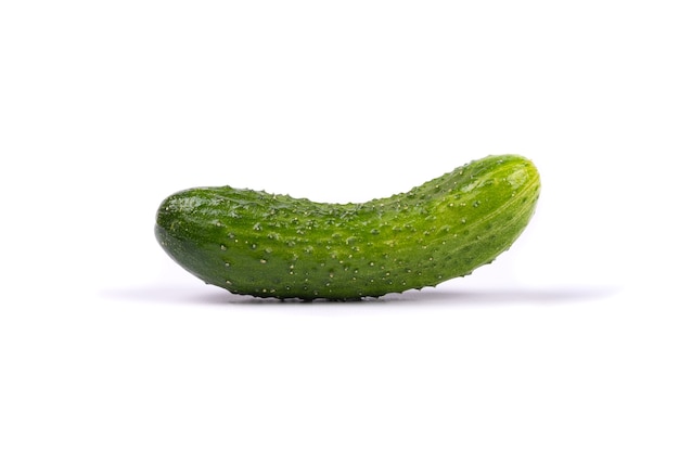 Green cucumber isolated on white wall.