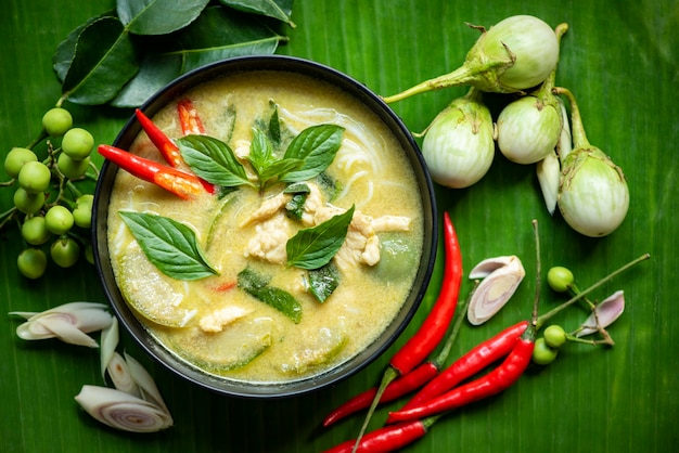 Green curry chicken cuisine asian food, Thai food on soup bowl with herbs and spices