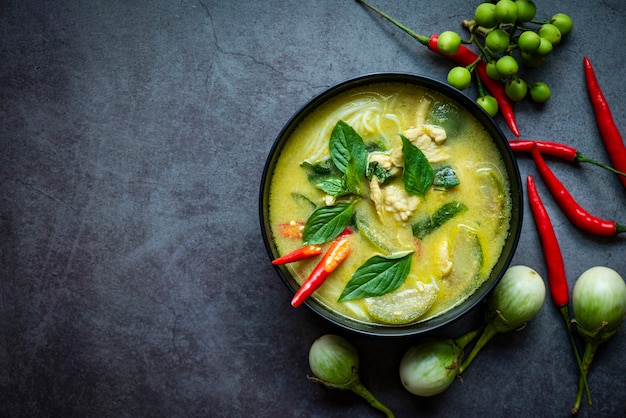 Green curry chicken cuisine asian food, Thai food on soup bowl with herbs and spices