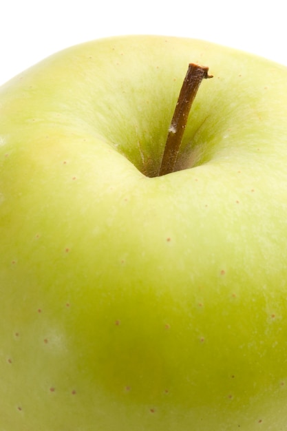 Green delicious apple on a white background