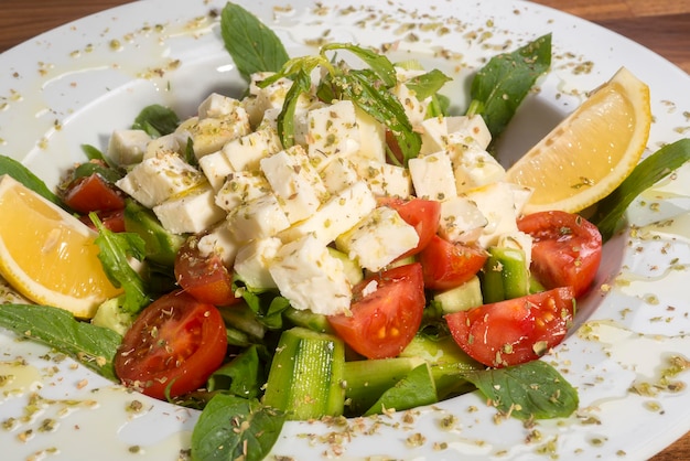 Green diet salad with cheese. Food photo.