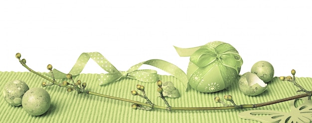 Green Easter border with painted eggs and Spring decorations