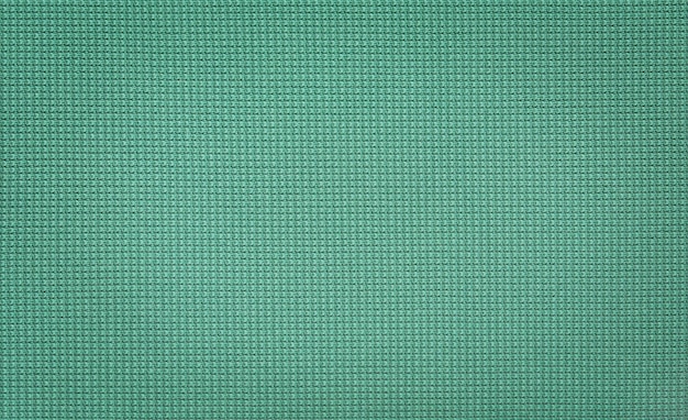 Зеленая ткань Тканевый фон Прямо над видом на зеленую тканевую ткань