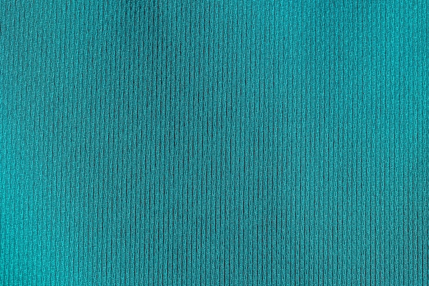 Green fabric cloth polyester texture background.