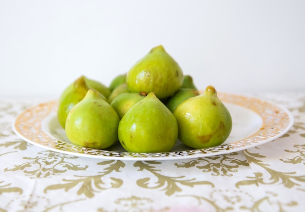 Green figs on a plate