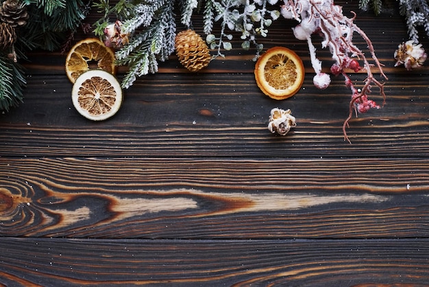 Green fir branches. Top view of christmas festive frame with new year decorations.