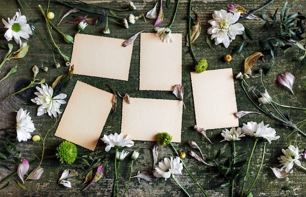 green flowers over notebook pages