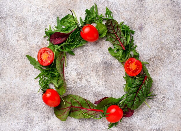 Green food background with salad leaves mix