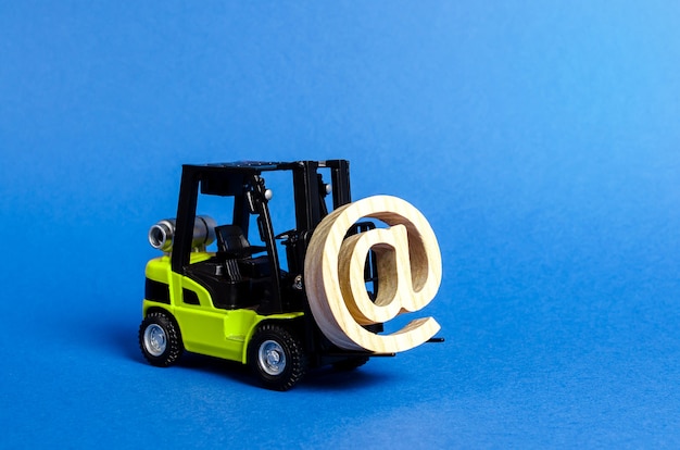 green forklift truck carry email symbol commercial at integration of the industry into network