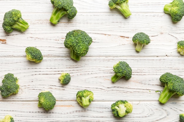 green fresh broccoli background close up on colored table Vegetables for diet and healthy eating Organic food