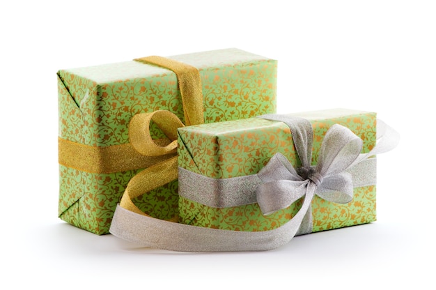 Green gift boxes with gold and silver ribbon