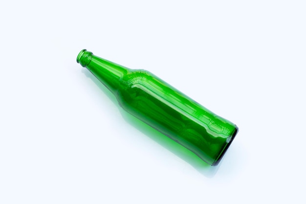 Green glass bottle isolated on white background