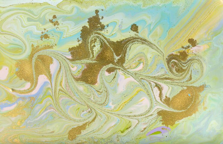 Photo green and gold pouring painting. pale beautiful background.
