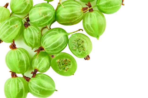 Photo green gooseberry berries on white isolated