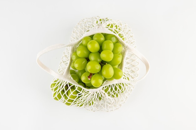 Green grapes on a plate.