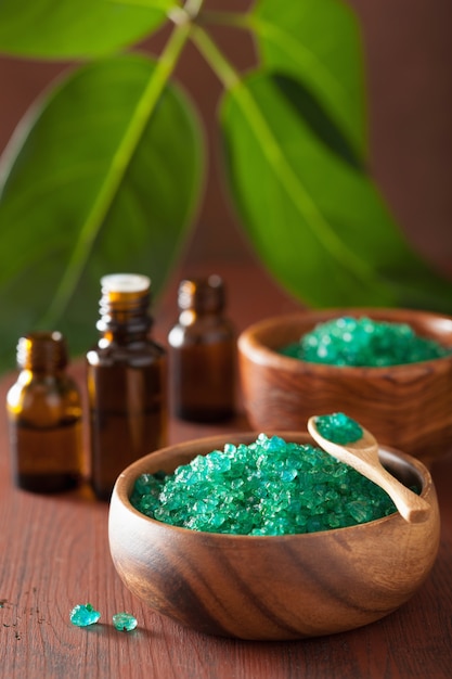 Green herbal salt and essential oils for healthy spa bath