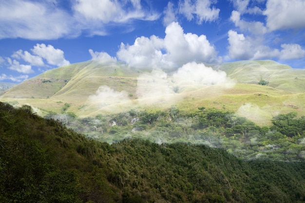 Green hills with landscape view with a blue sky background