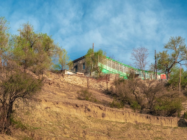 Green house on the top of a mountain. Guest house in Gunib. Dagestan.