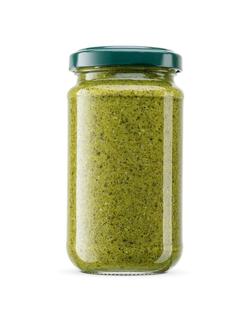 Photo green italian sauce pesto in glass jar with metal twist off lid isolated on a white background