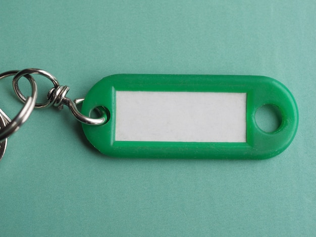 Green keyring with white label