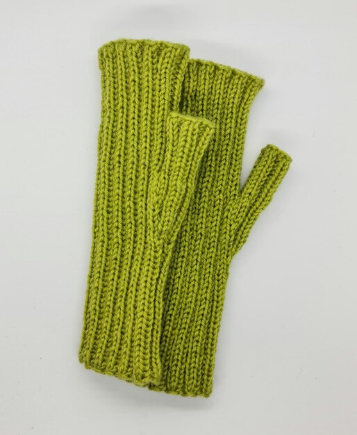 A green knitted glove