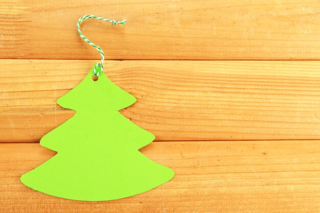 Green label on wooden background