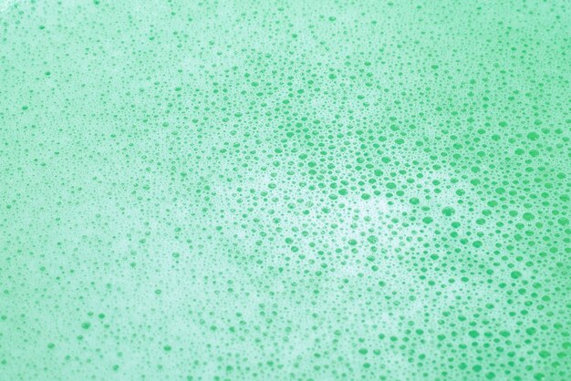 Green lather background top view Copy space