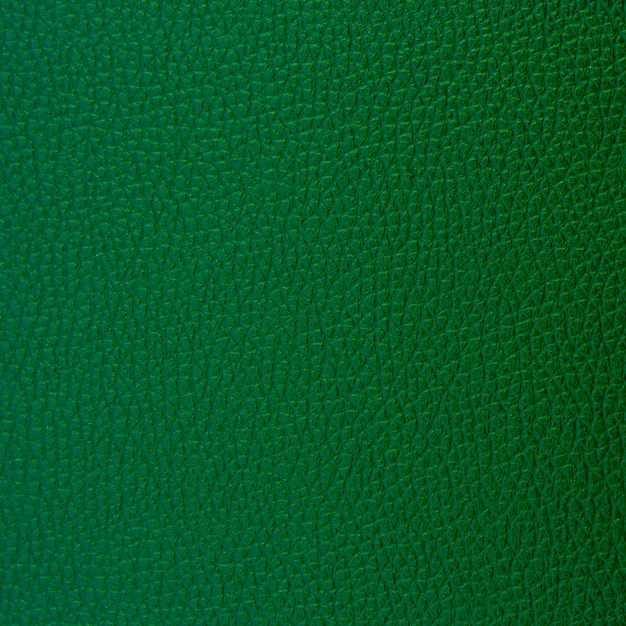 Green leather texture and background.