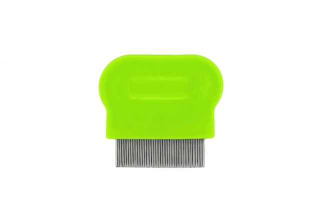 green lice comb floating isolated on a white background