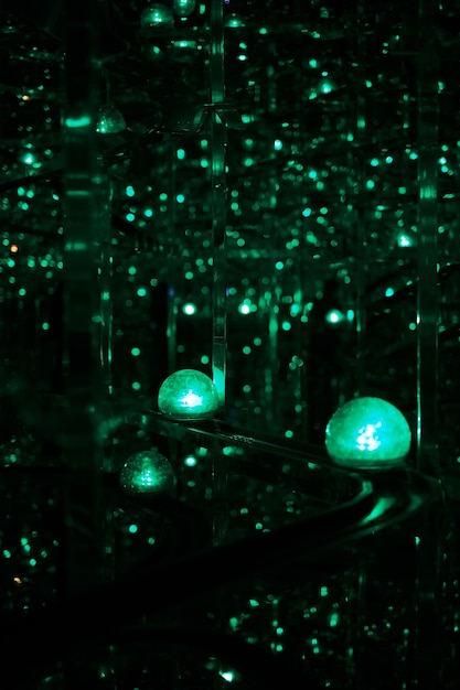 Green lights in a glass box