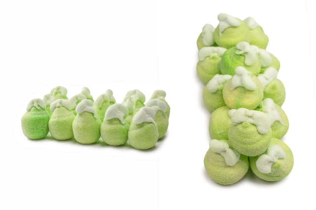 Green marshmallow candy isolated on white background