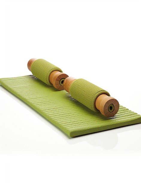 a green mat with the words  yoga  on it