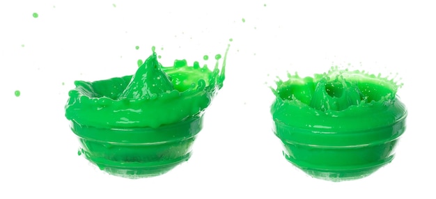 Green Matcha Milk Tea pour fall down explosion in air Green Matcha Milk Tea spill splash in shape glass bowl as paint color White background isolated high speed shutter freeze motion