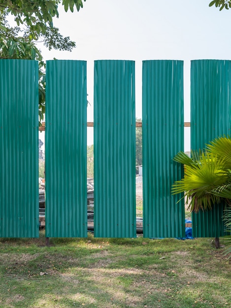 Green metal fence