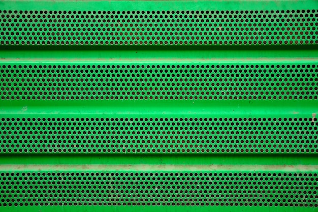 Green metal grill background