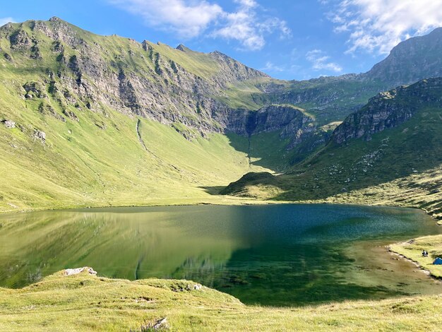 Green mountains and green lake tom