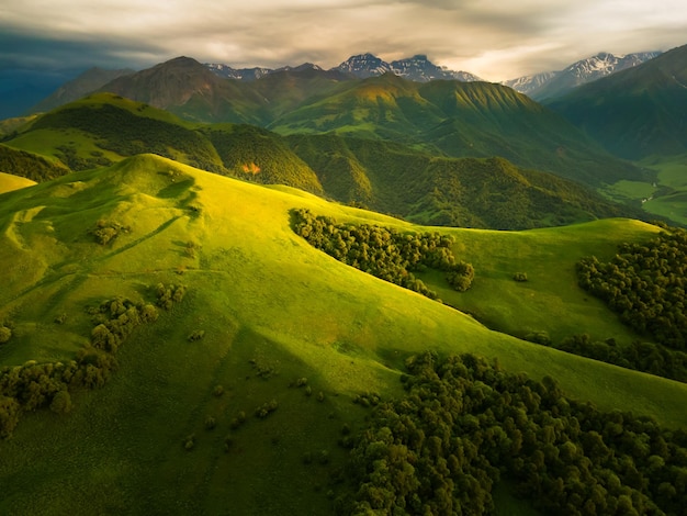 Green mountains and hills at sunset Aktoprak Pass in North Caucasus Russia