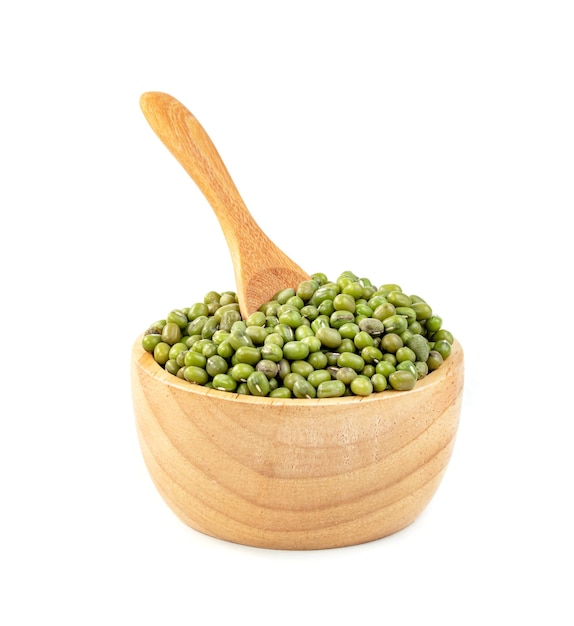 green mung beans with bowl and wooden spoon isolated on white background