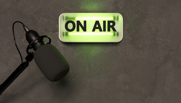 Фото Зеленая неоновая вывеска с надписью on air и студийным микрофоном под ней