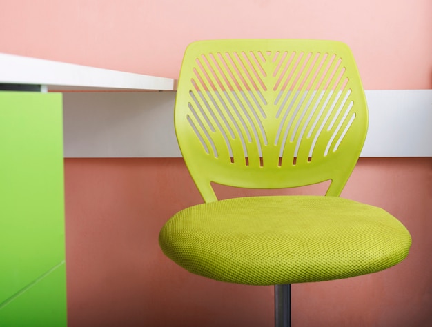 Green office desk and chair.