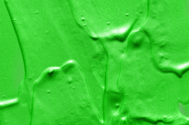 緑の油絵の具。デザイナーの背景