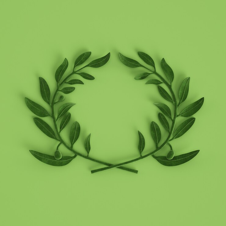 Photo green olive branch sculpture on pastel green background