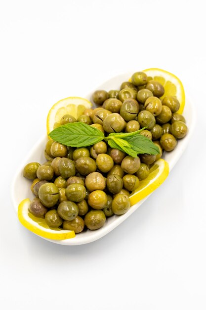 Green olive natural olive on isolated white background Healthy food close up