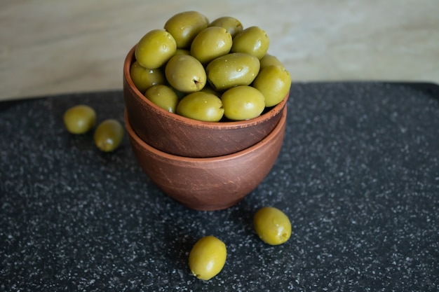 Green olives in a bowl